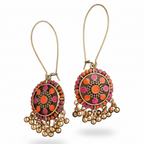 Ornate earrings with colorful circular design and gold accents on a white background