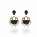 Pair of earrings with black stones and gold accents on a white background