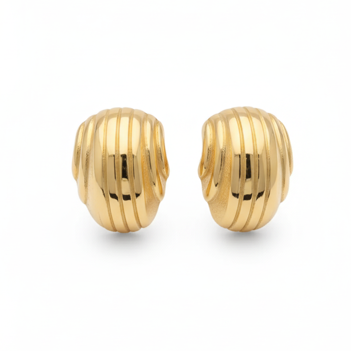 Pair of gold hoop earrings on a white background