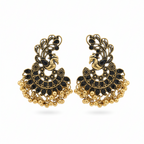 Pair of gold and black earrings on a white background