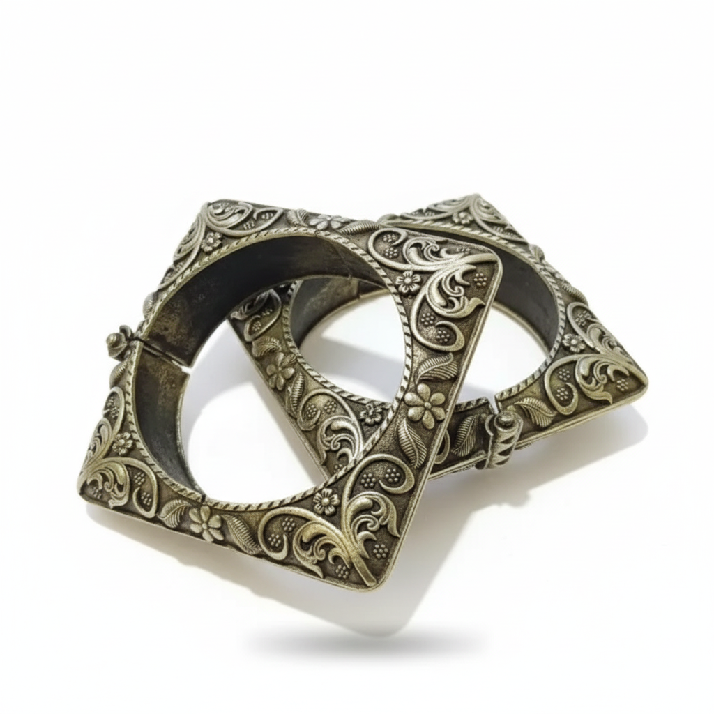 Decorative bronze belt buckle on a white background