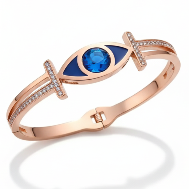 Rose gold bracelet with blue gemstone on a white background