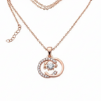 Rose gold necklace with a circular pendant on a white background