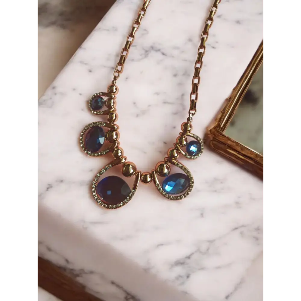 Adair Midnight Designer Oval Shaped Crystal Necklace With Gold Beads - Necklace